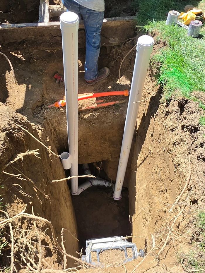 New sewer cleanouts in an excavated main line
